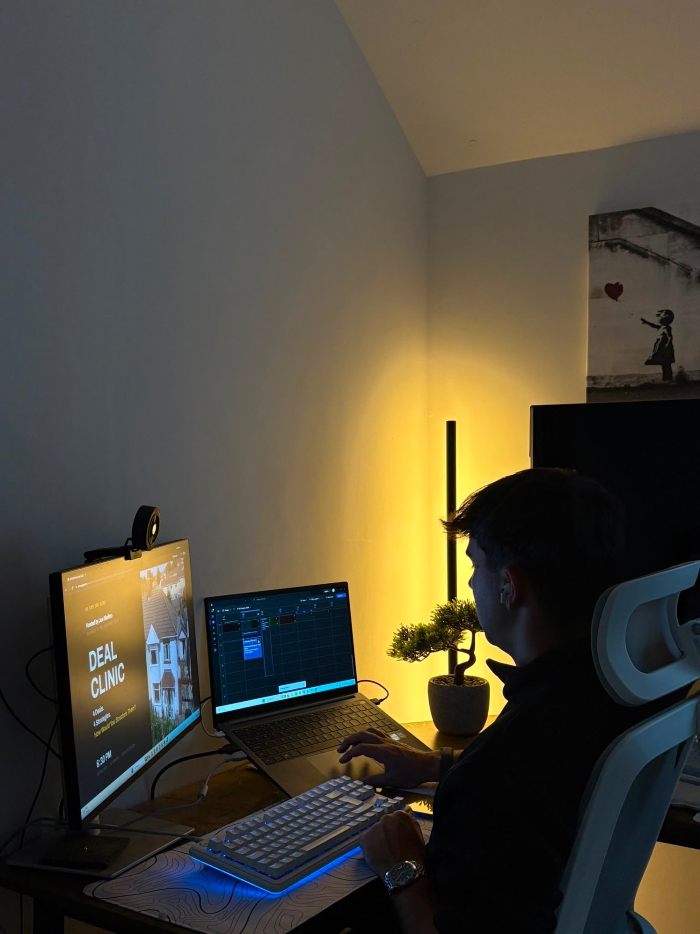 Joe working at his desk reviewing property deals